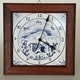 Orologio con cornice in legno